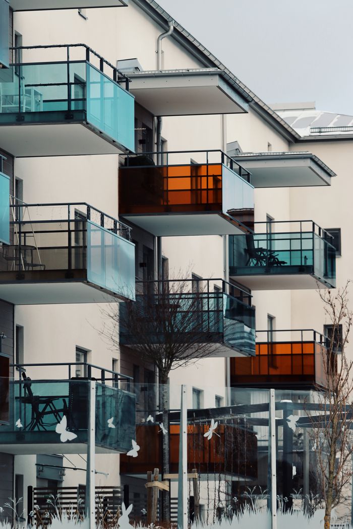 services-img Contemporary apartment building with colorful balconies in Jönköping, Sweden. Perfect for urban architecture themes.
