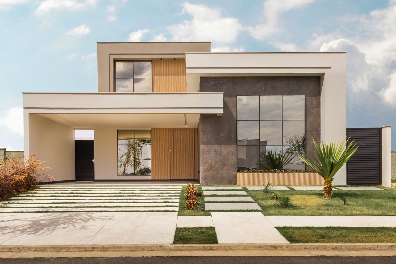 about-02 Contemporary house exterior with minimalist design, large windows, and landscaped front yard.